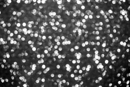Blurred black and white color bokeh for design background.