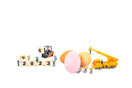Miniature people : Workers building number 2021, Happy new year conceptの写真素材