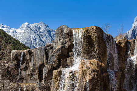 Landscape view of Blue Moon Valley located inside the Jade Dragon Snow Mountain scenic area, Lijiang China.の写真素材