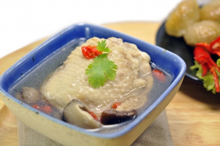 Chicken soup with mushroom and chinese  herbの写真素材