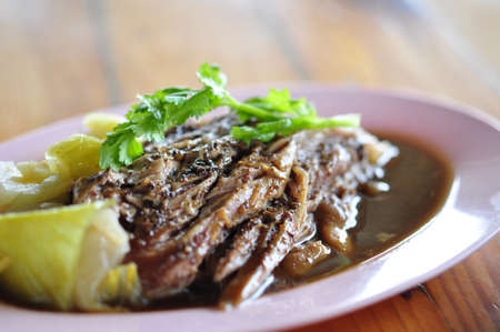 Tasty roasted pork meat on the tableの写真素材