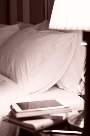 bed with a pillowの写真素材