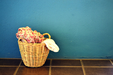 clothes in laundry basketの写真素材