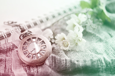 Antique pocket clock made with color filtersの写真素材