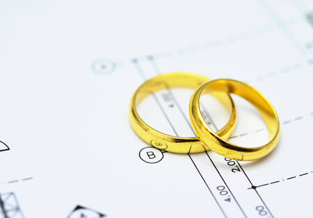 Couple of Wedding Rings on Calender symbolizing wedding date or anniversaryの写真素材