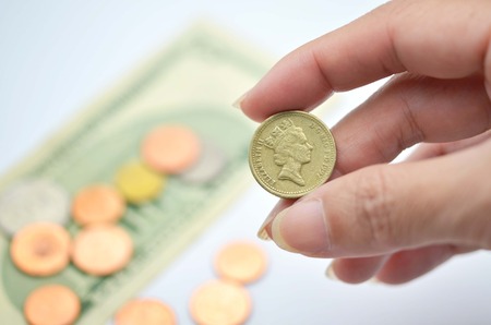 Money and coins in handの写真素材