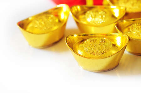 Chinese new year and gold ingotsの写真素材