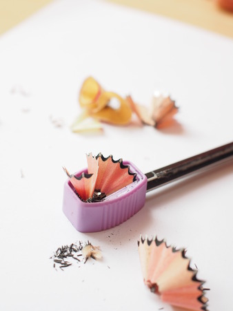 sharp pencil, sharpener and shavingsの写真素材