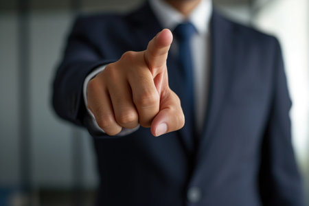 Businessman pointing his finger at you. Close up of male hand pointing at you. Generatvie AIの素材