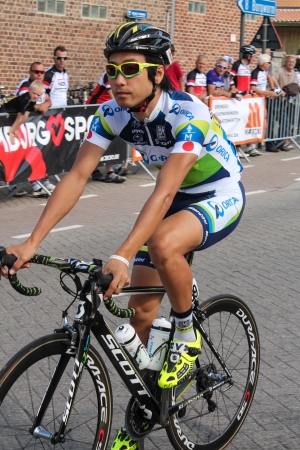 Heers, Belgium - August 9, 2012 - Japanese cyclist Fumiyuki Beppu warming up for start of stage 4 Eneco Tourのeditorial素材
