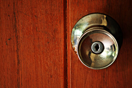 wooden door with grill の写真素材