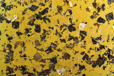 Shiny yellow gold foil abstract texture backgroundの写真素材