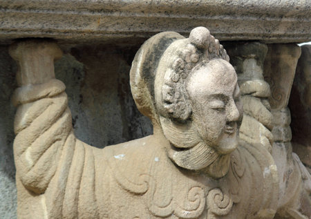 Ancient statue at Wat Suthat, Thailand  の写真素材
