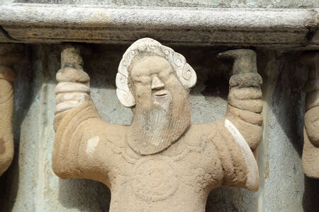 Ancient statue at Wat Suthat, Thailand 22 jul 2014の写真素材