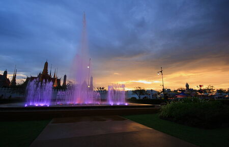 the colour of a fountain and the light from the sun in the evening at Bangkok , Thailandの写真素材