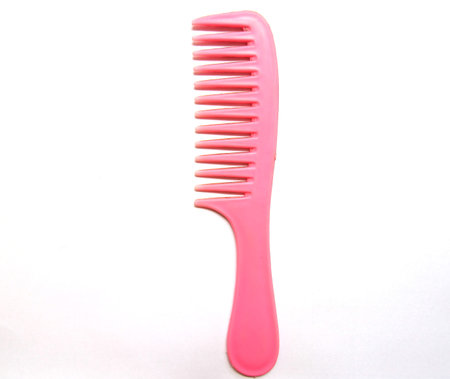 dirty Hair comb isolated on white background
