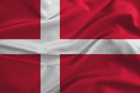 Waving flag of Denmark. Flag has real fabric textureの写真素材