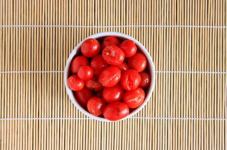 rotten old tomato with mildewの写真素材