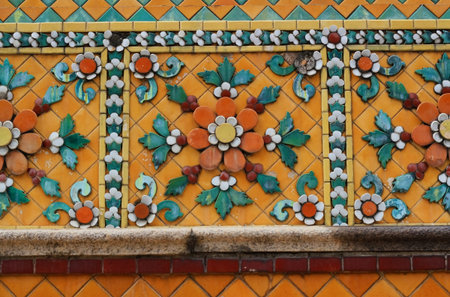 old ceramic tiles patterns at Temple of the Emerald Buddha or Wat  Pho at Bangkok, Thailand
