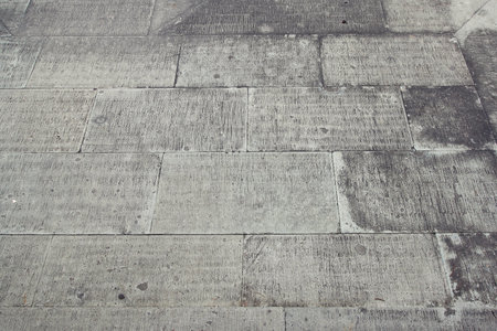 patterned paving tiles, old brick floor background