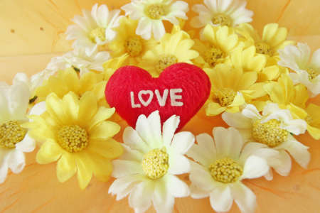 Valentine's day concept with letters "love" and flowers on vintage background, soft focusの写真素材