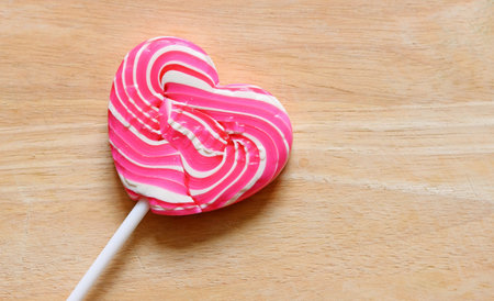 Colourful lollipop in the shape of a heart