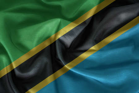 Waving Fabric Flag of Tanzaniaの写真素材