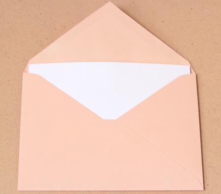 open envelope with paper on wood background, vintage toneの写真素材