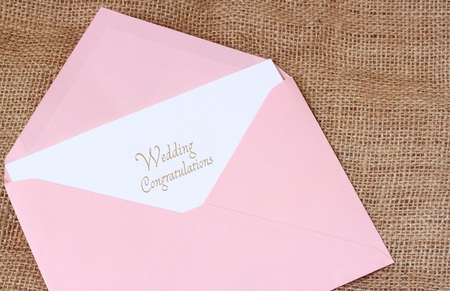 Open envelope with Wedding Congratulations card. typography lettering decorative text card designの写真素材