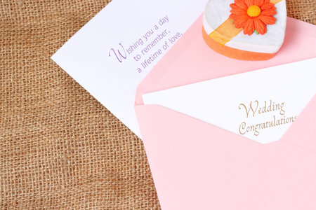 Open envelope with Wedding Congratulations card. typography lettering decorative text card design