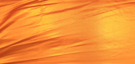 Gold thread on the fabric.の写真素材