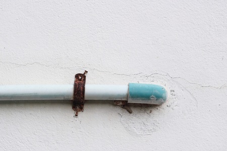 Old blue pipe of the water work systemの写真素材