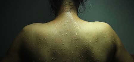 Sweat on body of woman ,exercise, Health Conceptの写真素材