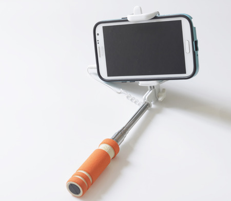 modern selfie stick on the whiteの写真素材