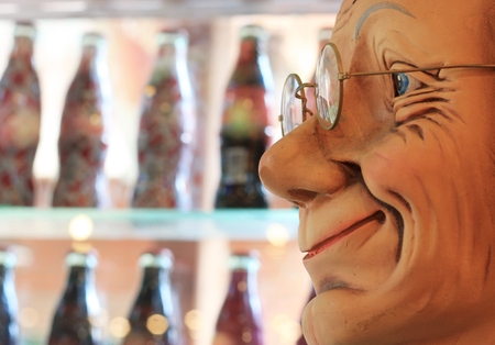 BANGKOK-THAILAND : MAY 18, 2017 Smile of old dolls in the shop selling drinks at Baan Bangkhen museumのeditorial素材