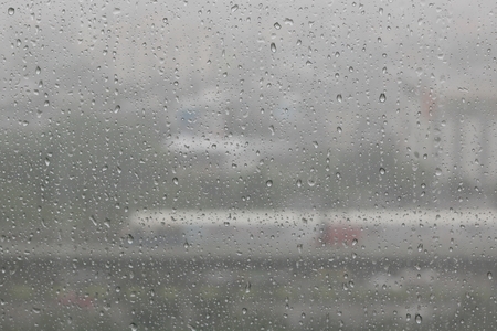 Rain water drops on blueの写真素材