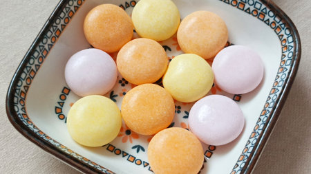 Colorful sweet candy in container