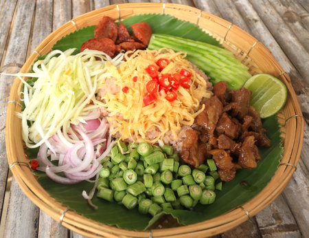 Sweet pork with shrimp paste fried rice, khao kluk kapi is traditional Thai foodの写真素材