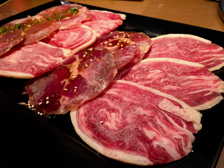 Beef slide on  dish for grillingの写真素材