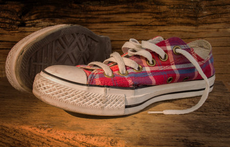 Shoes sneakers on the wooden の写真素材