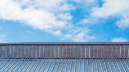 steel roof, blue sky background