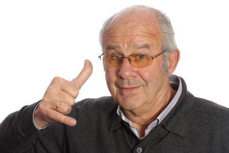 Elderly person with a statement to make a call with your hand