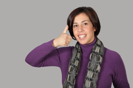 Woman with purple jacket and gray scarfの写真素材