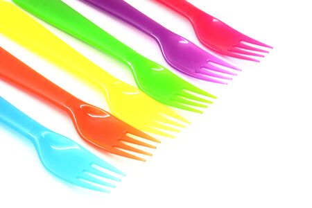 Set of different colours designed for children's use plastic forksの写真素材