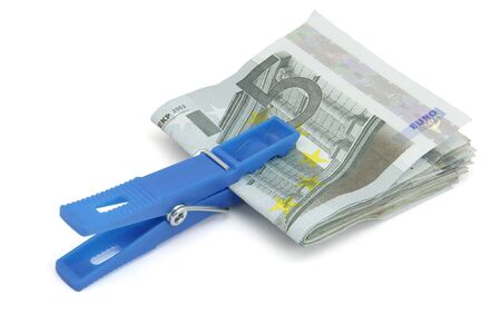 Wad of five euros bills on a white backgroundの写真素材