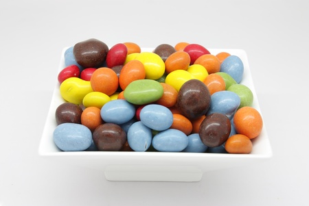 coated peanuts and chocolate candy in different colorsの写真素材