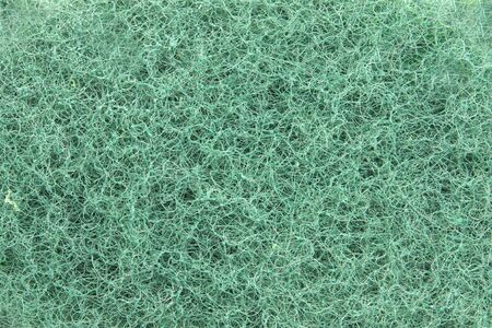 Scourer used to clean dishes and other household choresの写真素材