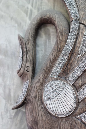 Swan Silver with carved wood trim.の写真素材