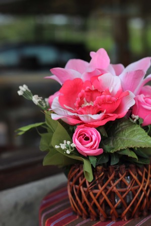 basket of peonies isolated on white backgroundの写真素材