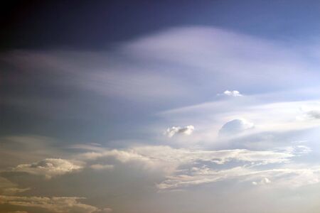 blue sky background with tiny cloudsの写真素材